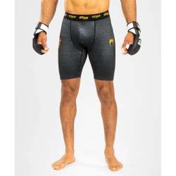 Calções de compressão Venum ares 2.0 preto dourado
